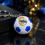 Blue-and-White Football Enamel Keychain — presentation view