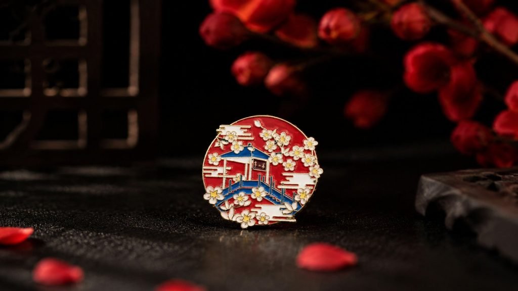 Red Pavilion and Blossom Enamel Pin — front display view