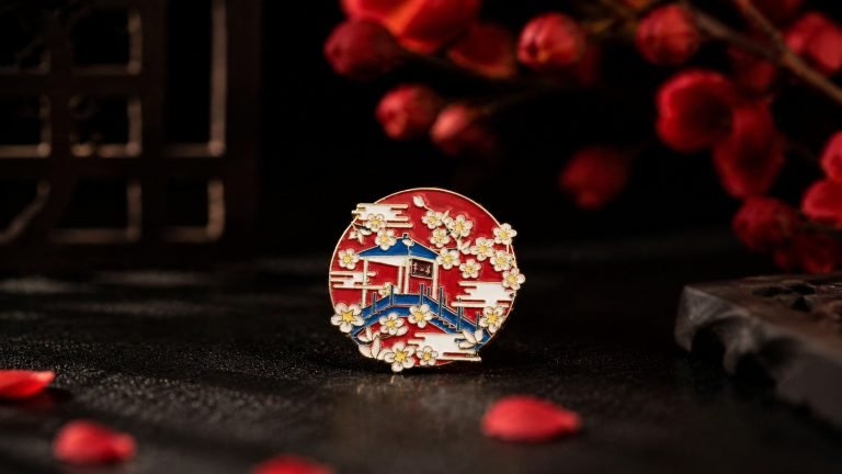 Red Pavilion and Blossom Enamel Pin — front display view
