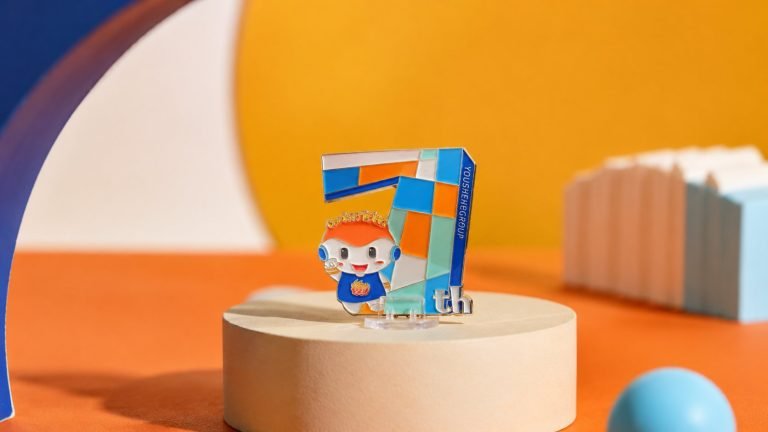 Seventh Anniversary Mascot Number Enamel Pin — front display view