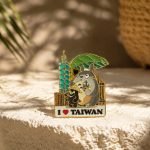 Taiwan 101 Cat Travel Enamel Pin — angled detail view