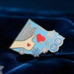 Winter Love Letter Enamel Pin — front display view