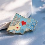 Winter Love Letter Enamel Pin — angled detail view